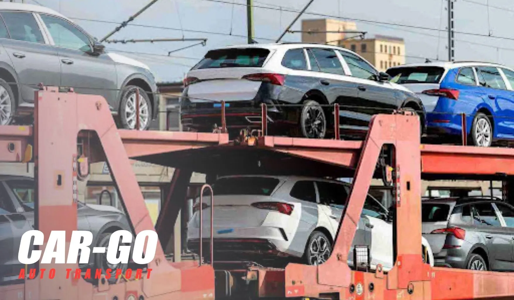 Multi-level auto carrier transporting cars by rail, illustrating vehicle shipping for employee relocations and corporate moves.