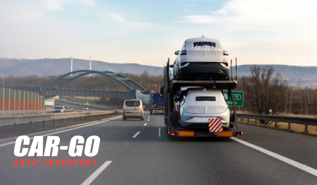 How Much Does It Cost to Ship a Car From Arizona to Texas? Vehicle transport trailer carrying two cars during a long-distance shipment to Ship a Car From Arizona to Texas.