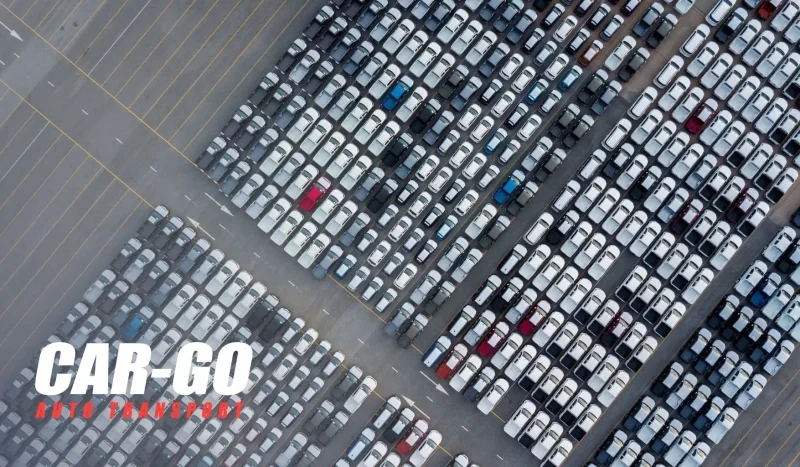 Aerial view of a vehicle distribution lot supporting corporate car shipping for fleet and dealership transport.
