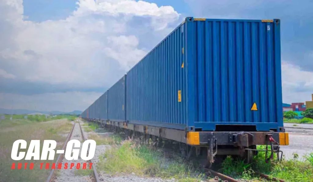 Freight containers loaded on a rail train, illustrating rail advantages in a truck vs rail car shipping comparison.
