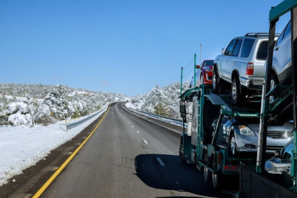 Car Shipping From California to Arizona: Cost, Timing & Best Routes Auto transport carrier hauling vehicles during Car Shipping California to Arizona along an open highway.